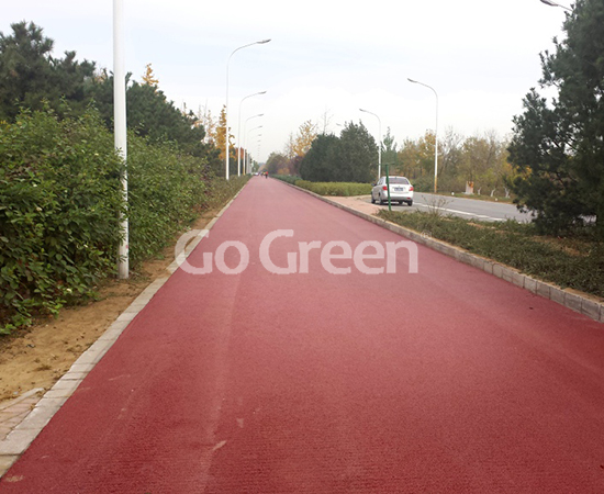 Proyecto de asfalto coloreado de mezcla cálida de color rojo