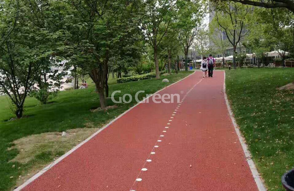 El proyecto de pavimento de asfalto poroso rojo Bund se completó con éxito